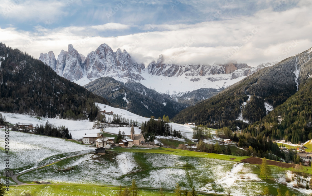 Famous alpine place of the world, Santa Maddalena village with magical Dolomites mountains in background, Val di Funes valley