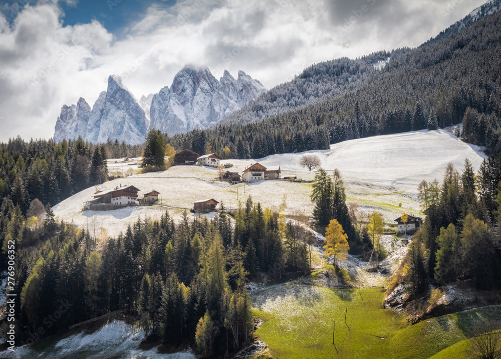 Famous alpine place of the world, Santa Maddalena village with magical Dolomites mountains in background, Val di Funes valley