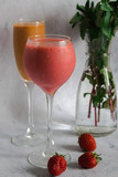smoothies in a glass on a white background