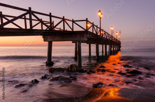 Early hours of daylight on the beach of Marbella on the Costa de Sol (Malaga) Spain