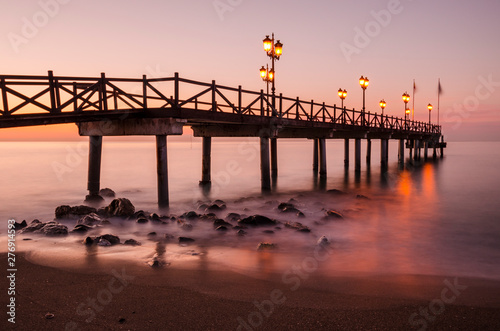 Early hours of daylight on the beach of Marbella on the Costa de Sol (Malaga) Spain