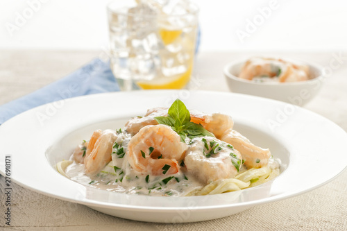 Shrimps in a creamy sauce with pasta