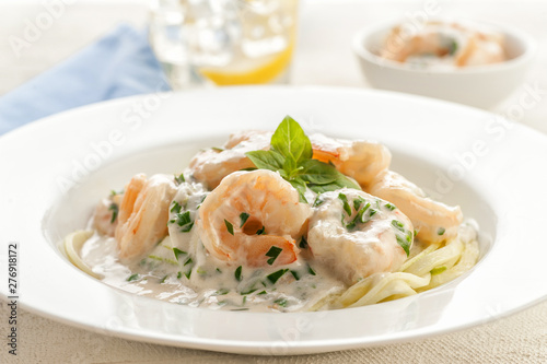 Shrimps in a creamy sauce with pasta