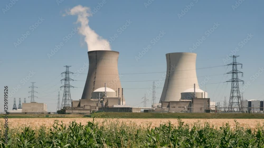 Doel Nuclear Power Station with two smoking cooling towers Doel Nuclear Power Station with two smoking cooling towers