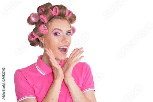 Portrait of beautiful woman with hair curlers
