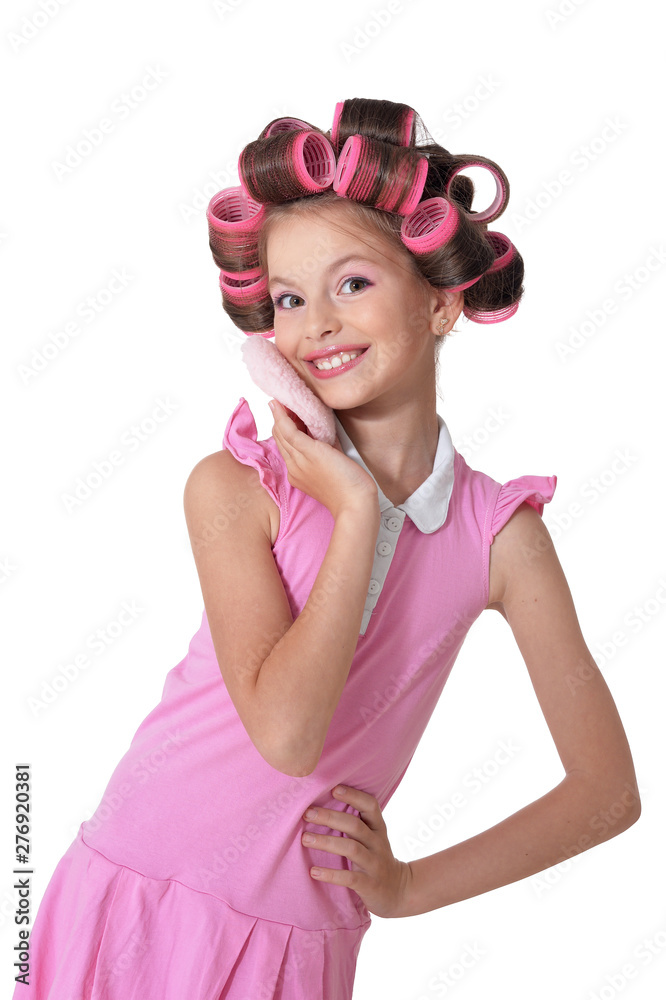 Portrait of little pretty girl with hair curlers posing Portrait of little pretty girl with hair curlers posing