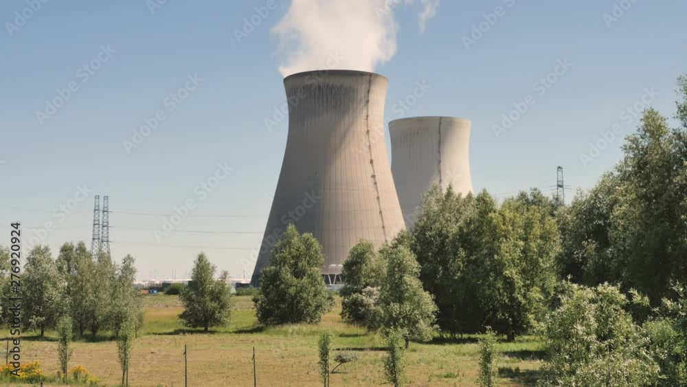 Doel Nuclear Power Station with smoking cooling towers Doel Nuclear Power Station with smoking cooling towers