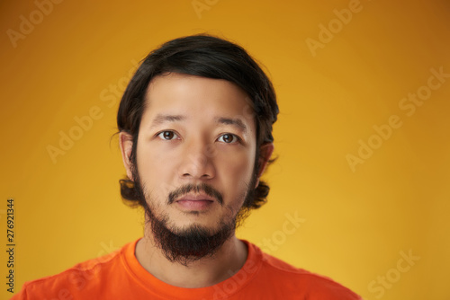 Asian guy headshot color background