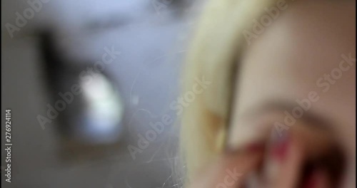 Dirty fingers poking an eye, close up, soft focus,