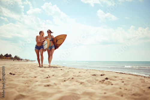 friend’s girls going to surfing. Healthy Active Lifestyle..