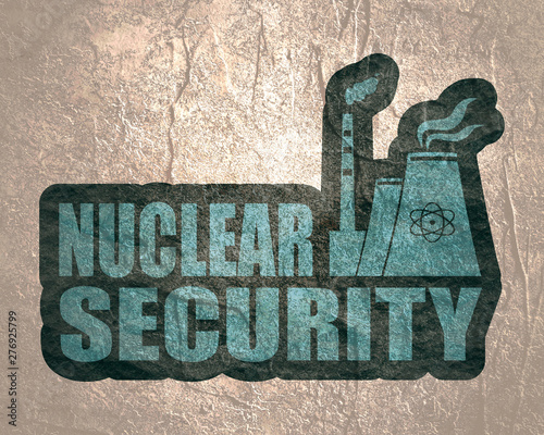 Atomic power station icon. Nuclear security text. photo