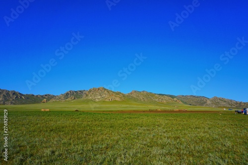 Blue sky infront of a mountain in rural Mongolia
