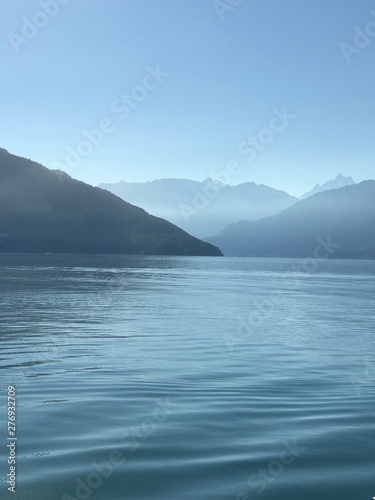 Thunersee, lake in Switzerland, Sun / light reflection. Spiez, Bern, Schweiz / Switzerland