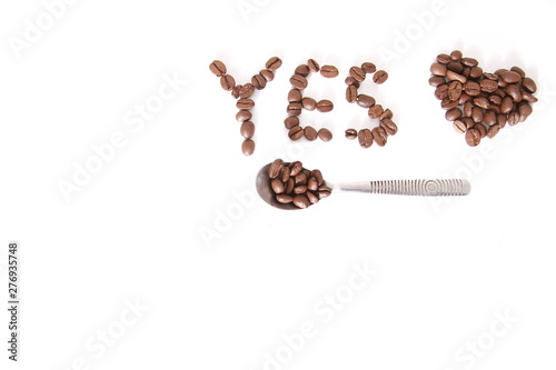roasted coffee beans sitting displayed on a table with white bacground no people stock photo
