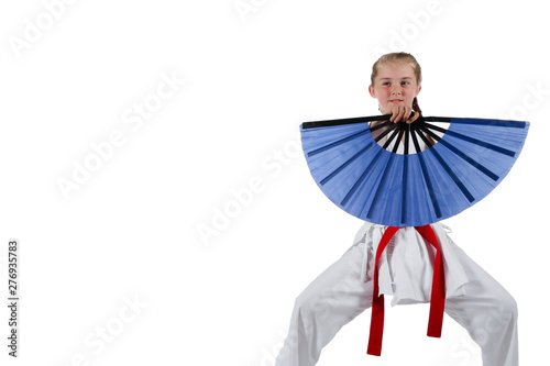 Tweenage girl going karate photo