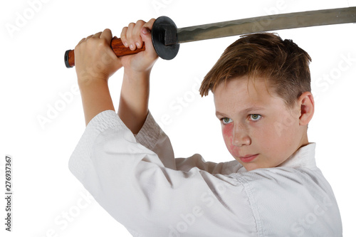 Teenage boy doing martial arts photo