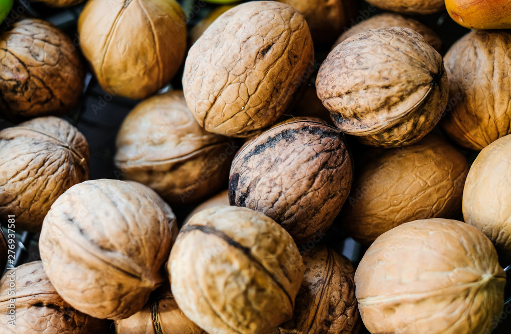 The unshelled walnuts in the shell The unshelled walnuts in the shell