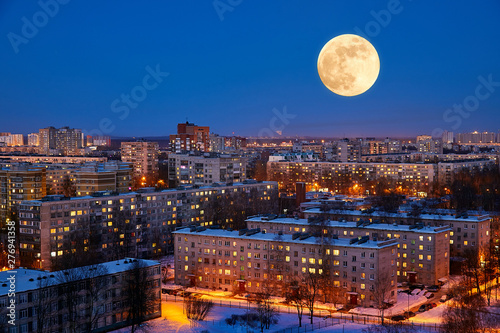 moon rise on the background of the evening city
