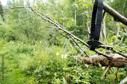 The knife in its sheath. On my belt in a holster. Backpack hike.