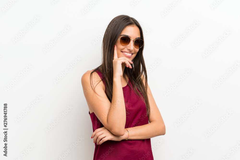 Young woman over isolated white background with glasses Young woman over isolated white background with glasses