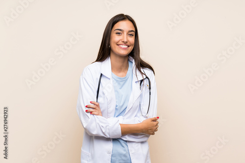 Fotografia, Obraz Young doctor woman over isolated background laughing