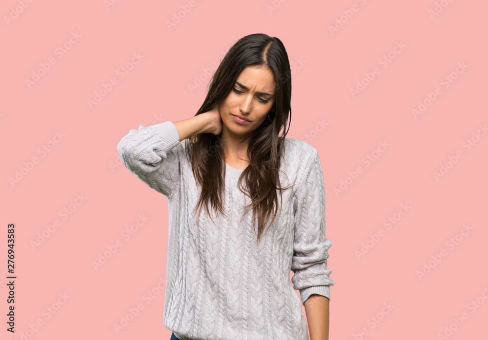 Young hispanic brunette woman with neckache over isolated background Young hispanic brunette woman with neckache over isolated background