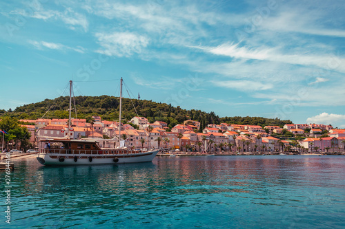 Embankment of Korcula on the island of the same name. Ship in the harbour. Croatia. Summer travel concept.