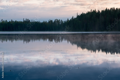 Misty Sunrise over a finnish lake in dark forest with beautiful reflections, Kainuu, Finland © sg-naturephoto.com 