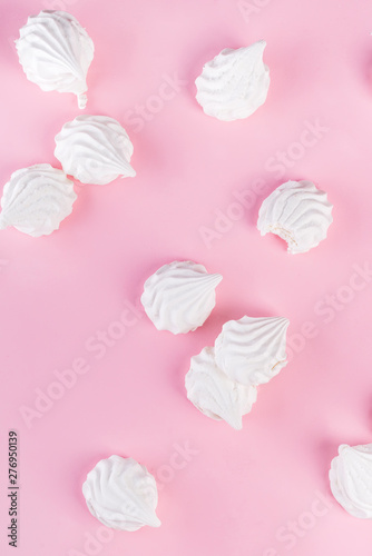 Sweet dessert white zephyr marshmallows isolated on pink background