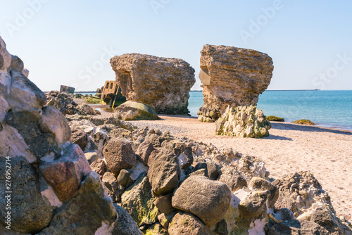 Fototapeta Naklejka Na Ścianę i Meble -  Ruins of bunkers on the beach of the Baltic sea in Liepaja, Latvia.
