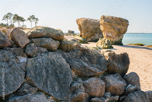Fototapeta Naklejka Na Ścianę i Meble -  Ruins of bunkers on the beach of the Baltic sea in Liepaja, Latvia.