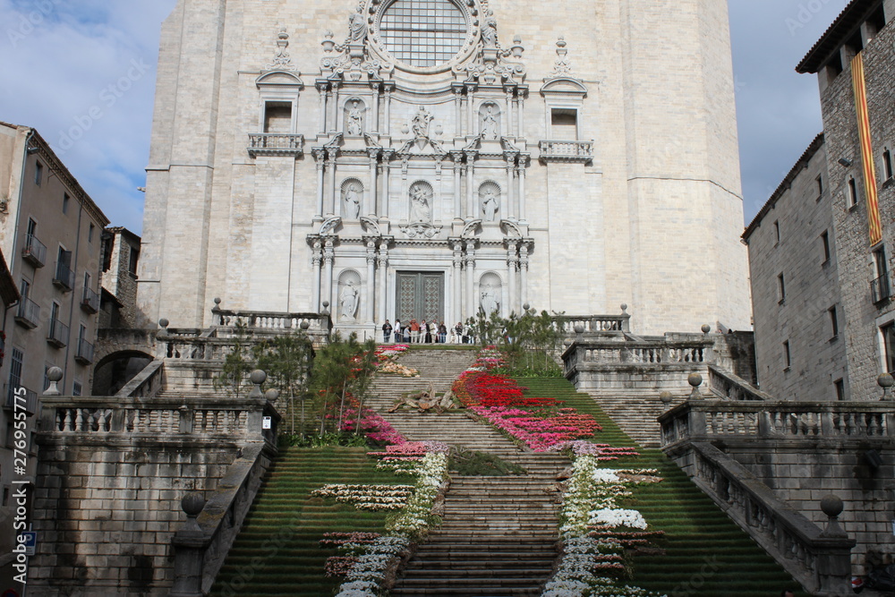 Girona cathedral with flowers in the stairs