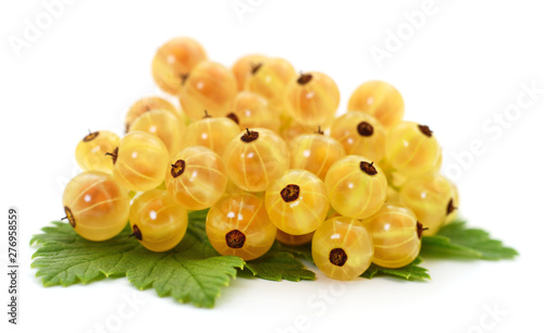 White currants with green leaves.