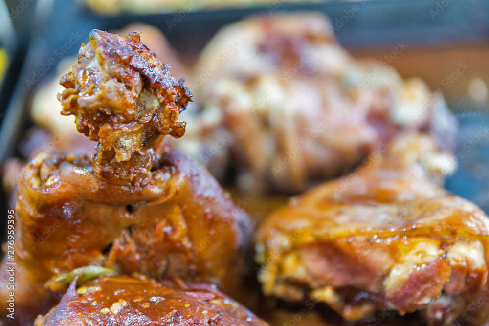 Barbecued chicken tasty drumsticks closeup Barbecued chicken tasty drumsticks closeup