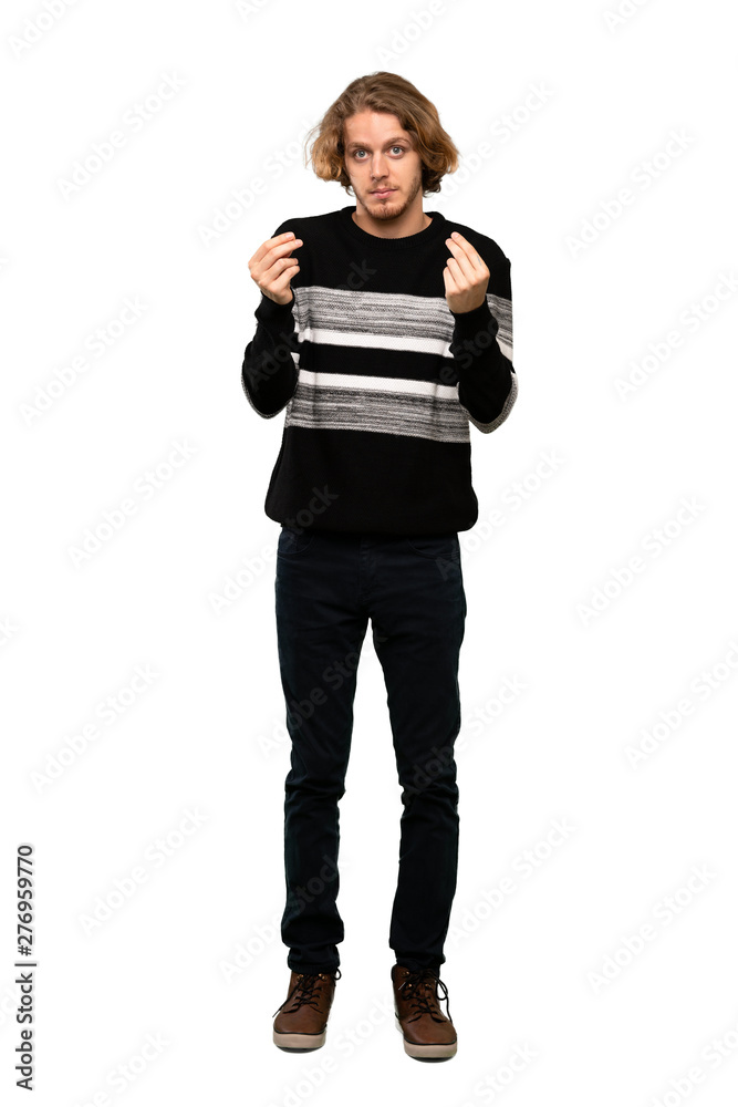 Full-length shot of Blonde man making money gesture over isolated white background Full-length shot of Blonde man making money gesture over isolated white background