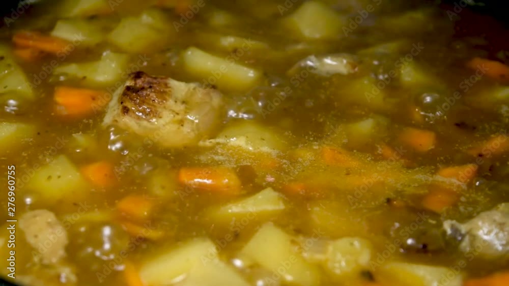 Fried potatoes with meat and carrots, close-up
Fried potatoes with meat and carrots, close-up