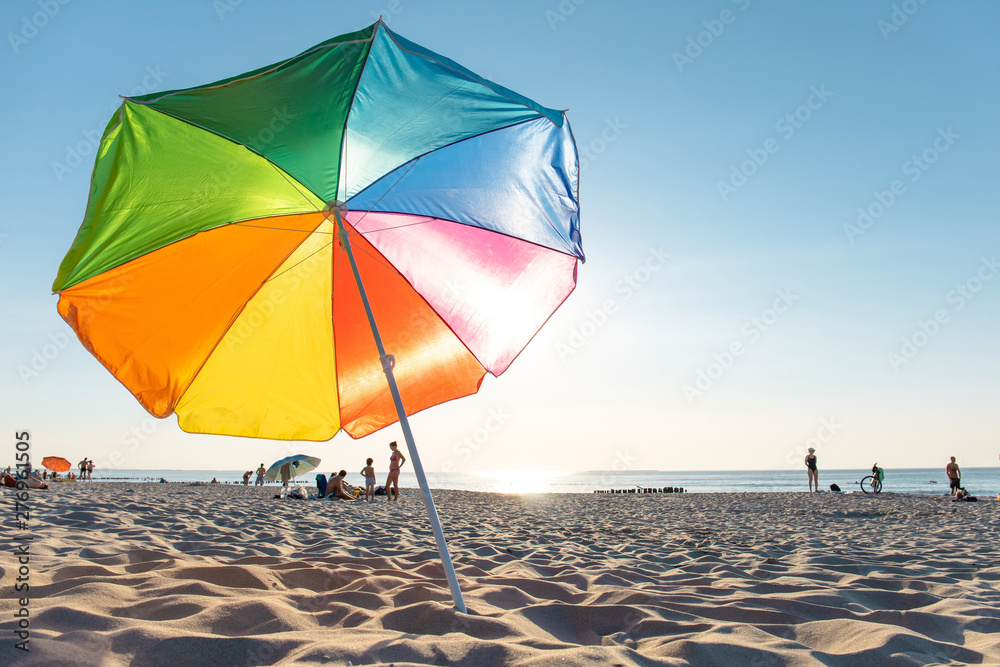 bright colorful beach umbrella for sun protection