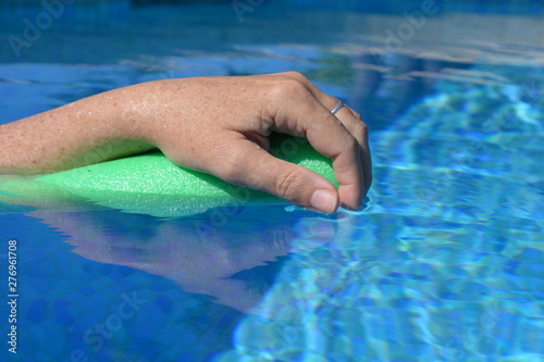 hand in swimming pool