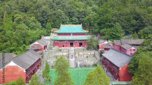 The Grand Hall inside Purple Heaven Palace. A beautiful ancient Taoist temple with red walls and green tiles. Wudang Mountain at Hubei province, China photo