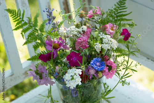 Fototapeta Naklejka Na Ścianę i Meble -  Colorful wild flower bouquet  in a summer garden
