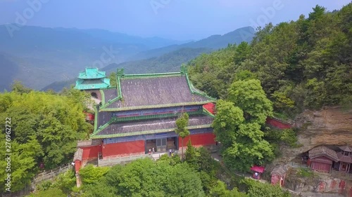 Nanyan or south cliff temple is one of the most breathtaking sites of the Wudang Mountains. Ancient traditional chinese temple  dated from Tang Dynasty photo