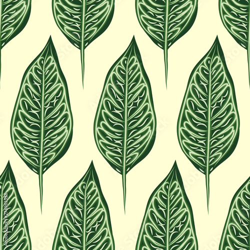 Seamless pattern with leaves of ficus benjamin on green background