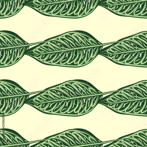 Seamless pattern with leaves of ficus benjamin on green background