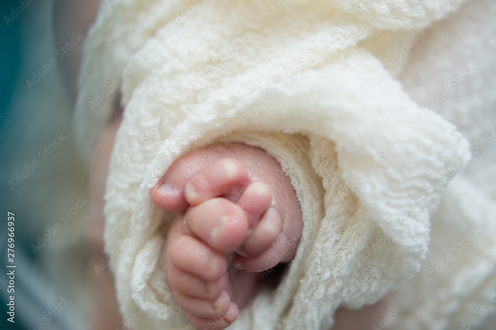baby feet on background. feet of a newborn baby. little foot baby feet on background. feet of a newborn baby. little foot