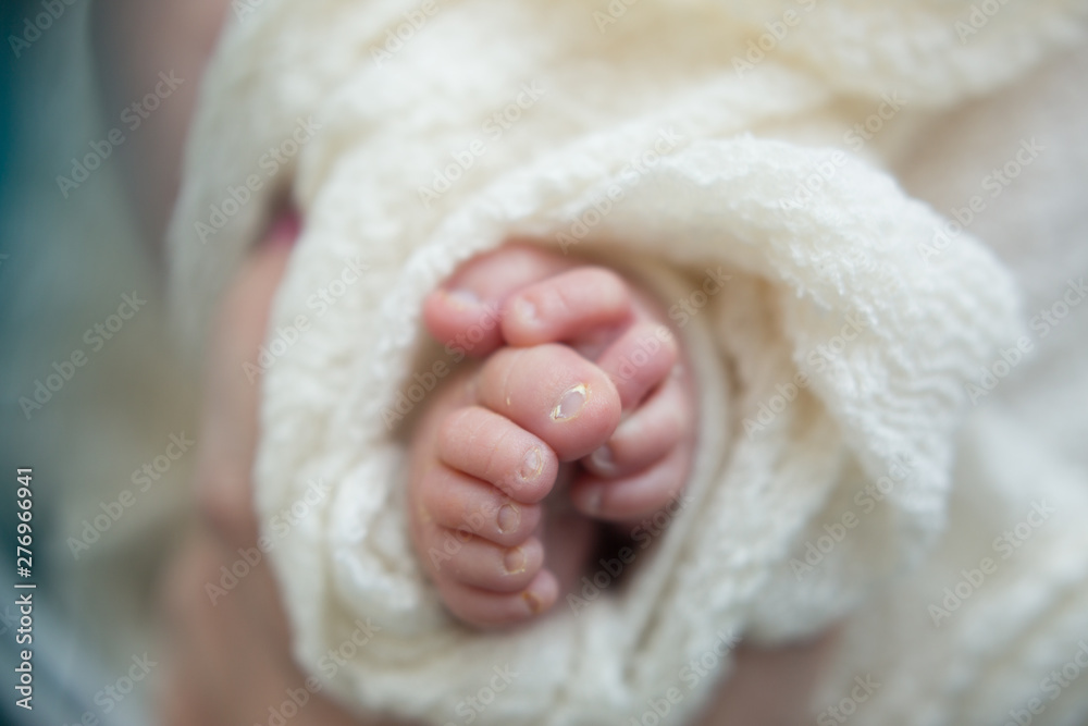 baby feet on background. feet of a newborn baby. little foot baby feet on background. feet of a newborn baby. little foot