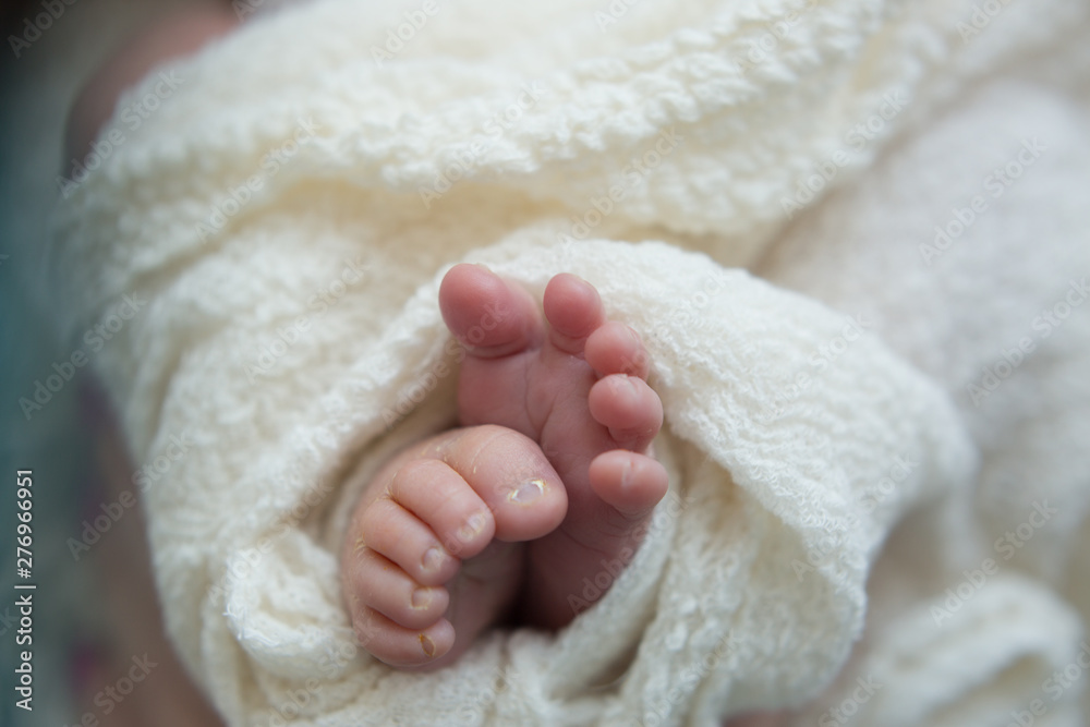 baby feet on background. feet of a newborn baby. little foot baby feet on background. feet of a newborn baby. little foot