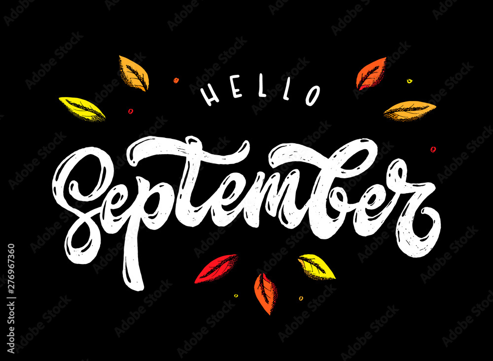cute hand lettering quote 'Hello September' decorated by autumn leaves on black background