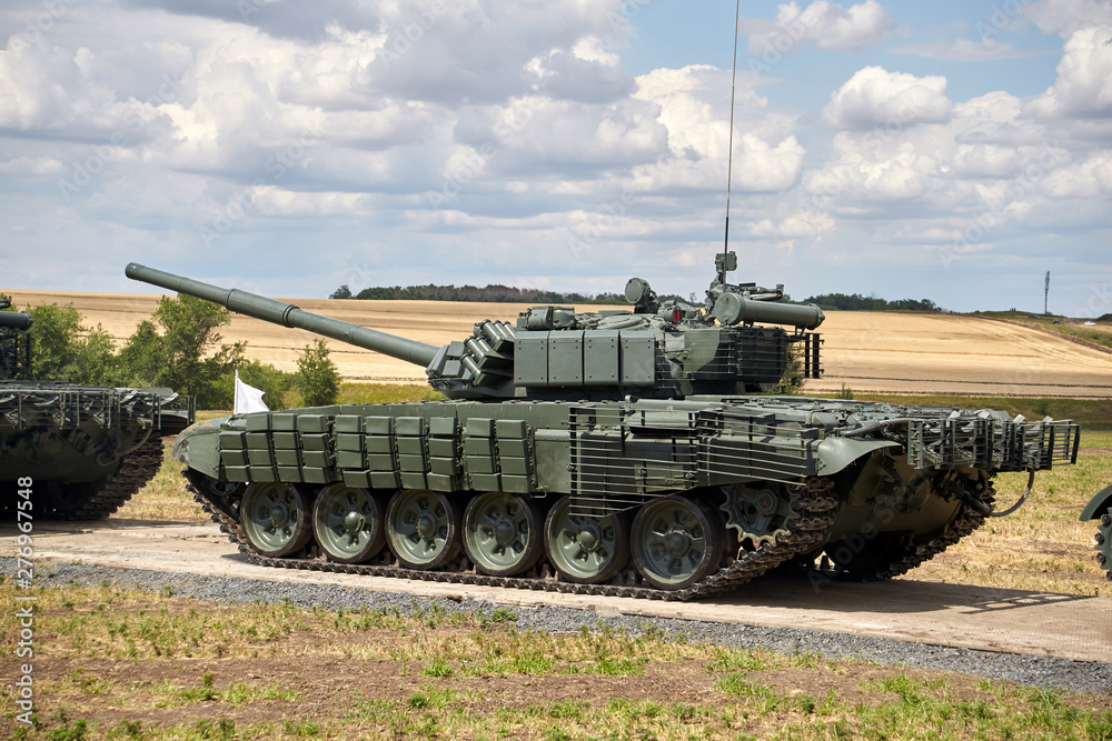 A column of modern military tanks A column of modern military tanks