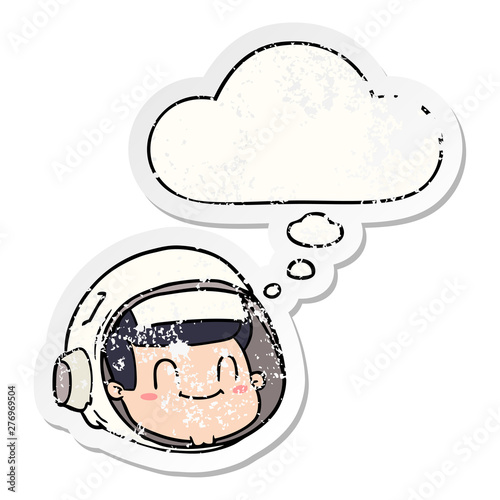 cartoon astronaut face and thought bubble as a distressed worn sticker