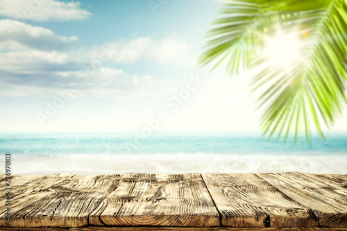 Fototapeta Naklejka Na Ścianę i Meble -  Desk of free space and summer beach background 